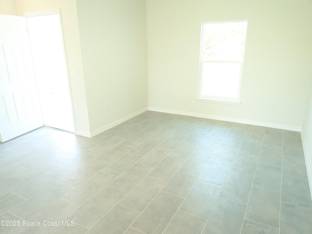 2100 Cogan Dr SE, Palm Bay, FL 32909 - spare room with baseboards