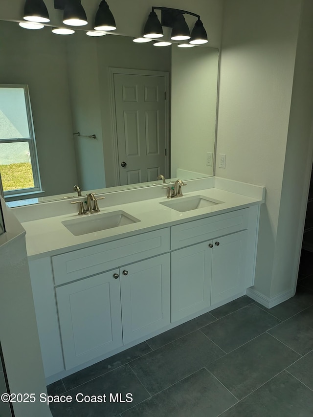 2100 Cogan Dr SE, Palm Bay, FL 32909 - full bathroom featuring tile patterned flooring, double vanity, and a sink