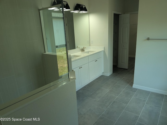 2100 Cogan Dr SE, Palm Bay, FL 32909 - full bath featuring tile patterned floors, vanity, and baseboards