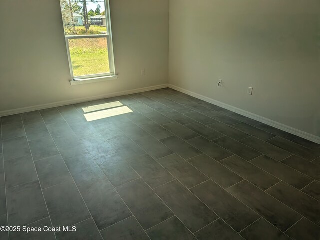 2100 Cogan Dr SE, Palm Bay, FL 32909 - unfurnished room with baseboards