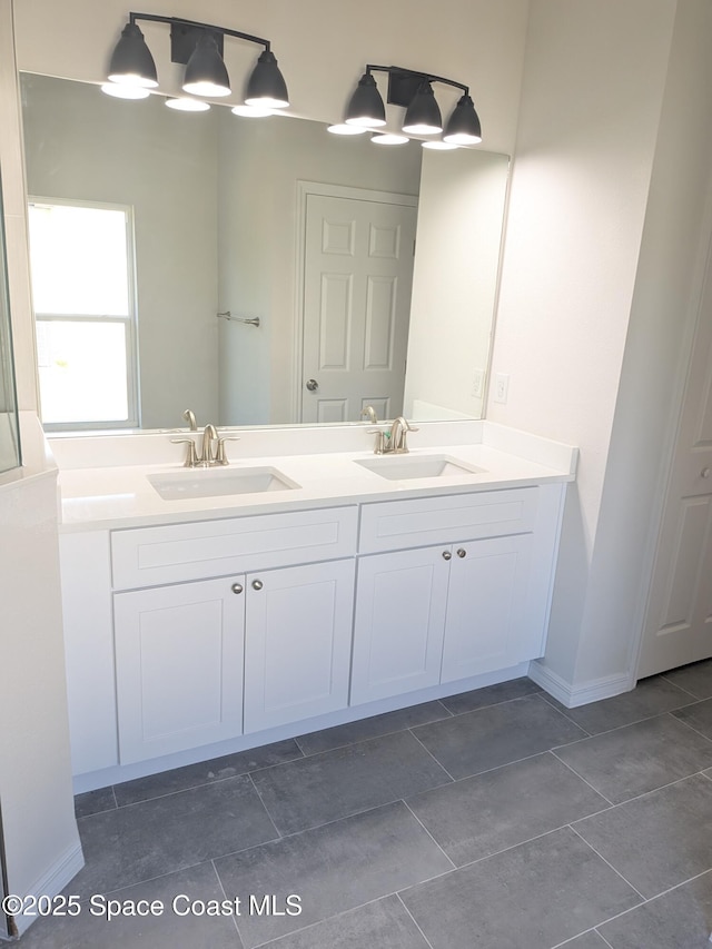 2100 Cogan Dr SE, Palm Bay, FL 32909 - full bath featuring a sink and double vanity