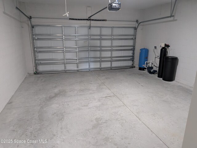 2100 Cogan Dr SE, Palm Bay, FL 32909 - garage featuring a garage door opener