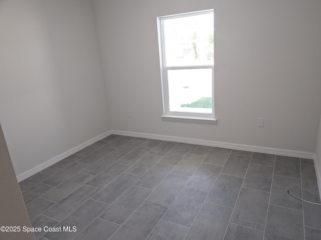 2100 Cogan Dr SE, Palm Bay, FL 32909 - unfurnished room featuring baseboards