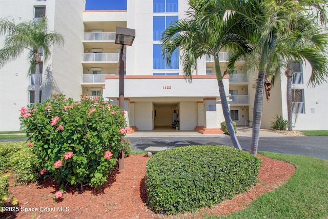 view of property featuring aphalt driveway