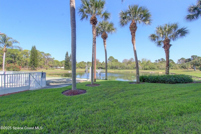 view of yard with a water view