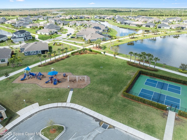 aerial view featuring a water view and a residential view