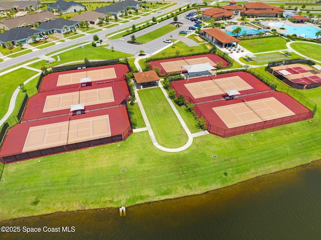 bird's eye view with a water view and a residential view