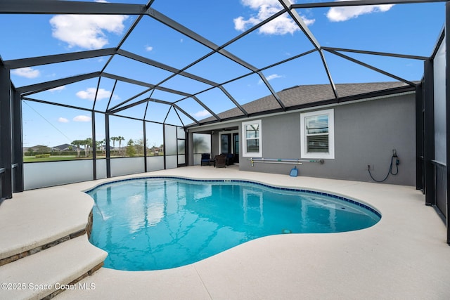 outdoor pool with a lanai and a patio