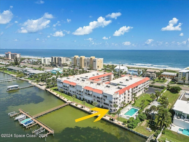 birds eye view of property featuring a water view