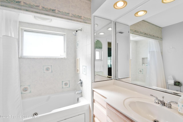 full bath with visible vents, shower / bath combination with curtain, and vanity