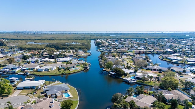 aerial view featuring a residential view and a water view