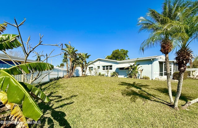 view of yard with fence