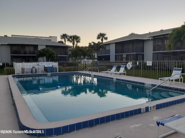 community pool with fence