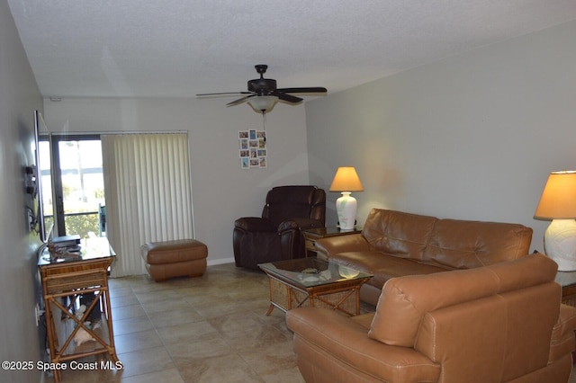 living room with light tile patterned flooring and ceiling fan