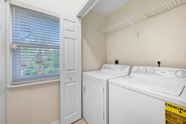 laundry area featuring laundry area and washer and clothes dryer