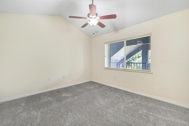 unfurnished room featuring a ceiling fan, lofted ceiling, carpet flooring, and baseboards