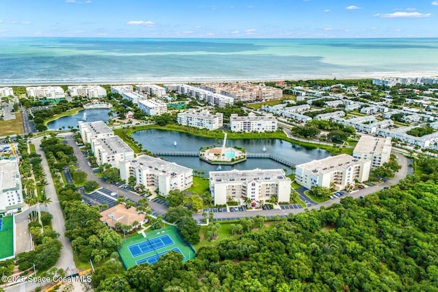 bird's eye view with a view of city and a water view