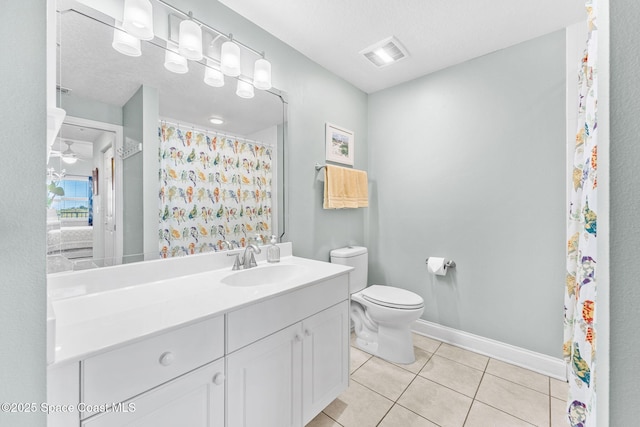 full bath with ceiling fan, tile patterned flooring, toilet, visible vents, and baseboards