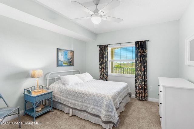 bedroom with light carpet, ceiling fan, and baseboards