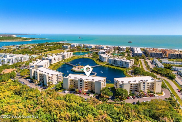 aerial view featuring a water view and a city view