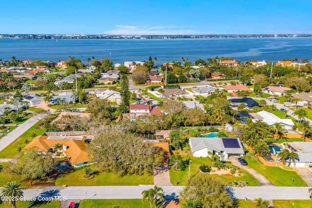 aerial view featuring a water view and a residential view