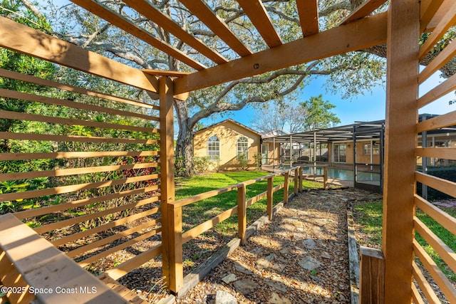 view of yard featuring a lanai