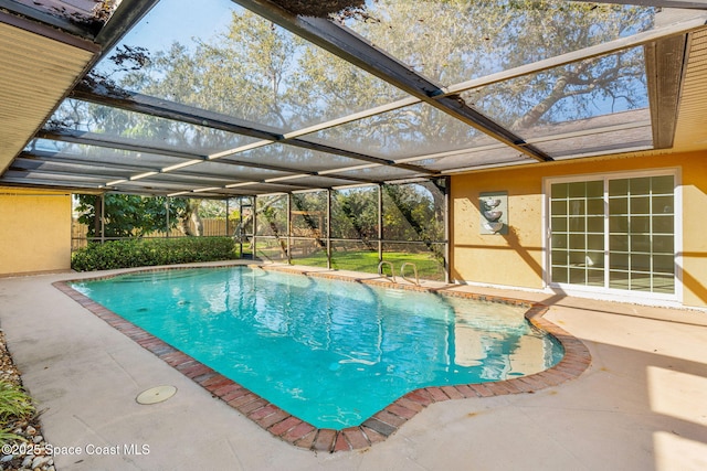 pool with a patio area