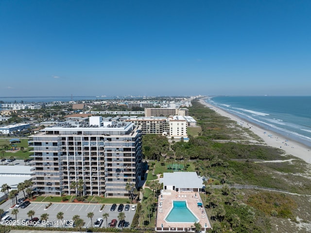 bird's eye view with a beach view and a water view