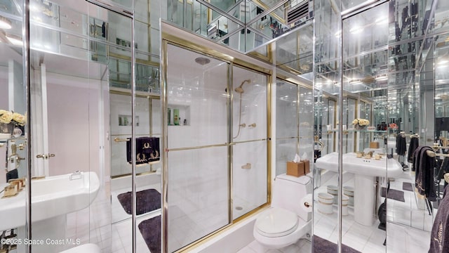 full bathroom featuring tile patterned flooring, a shower with door, and toilet