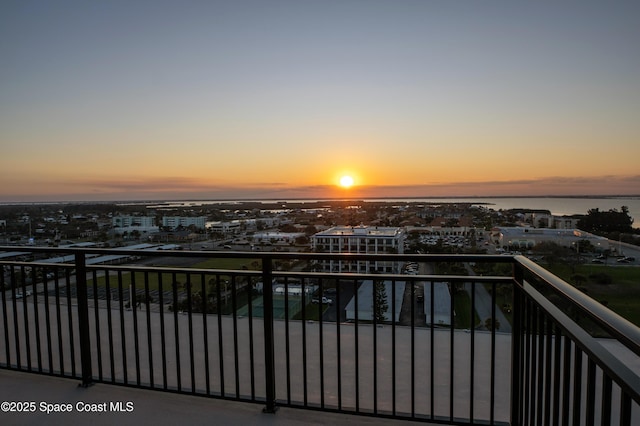 balcony featuring a water view