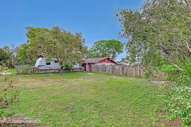 view of yard featuring fence