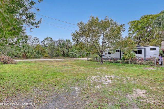 view of yard featuring fence