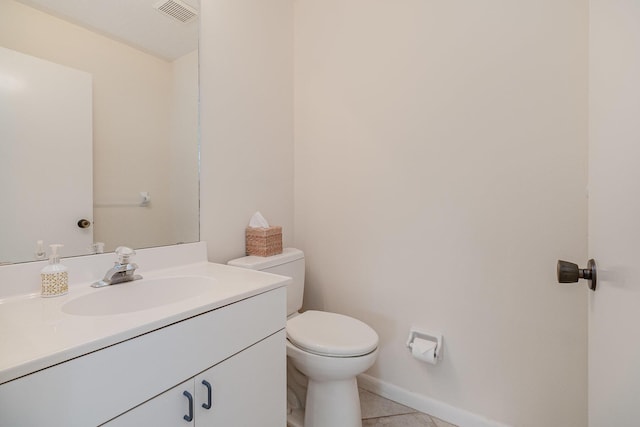 bathroom featuring baseboards, visible vents, toilet, tile patterned floors, and vanity