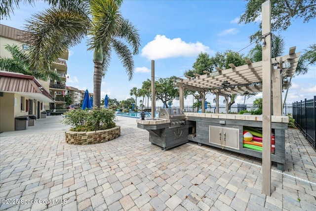 view of community featuring a patio, area for grilling, fence, a pergola, and a swimming pool