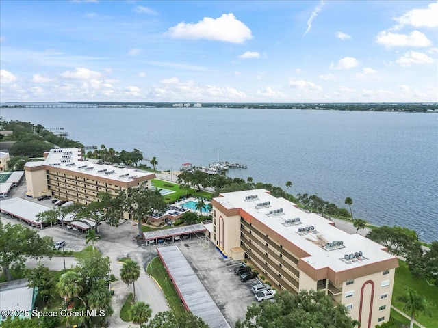 birds eye view of property featuring a water view