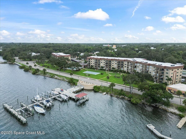 birds eye view of property featuring a water view