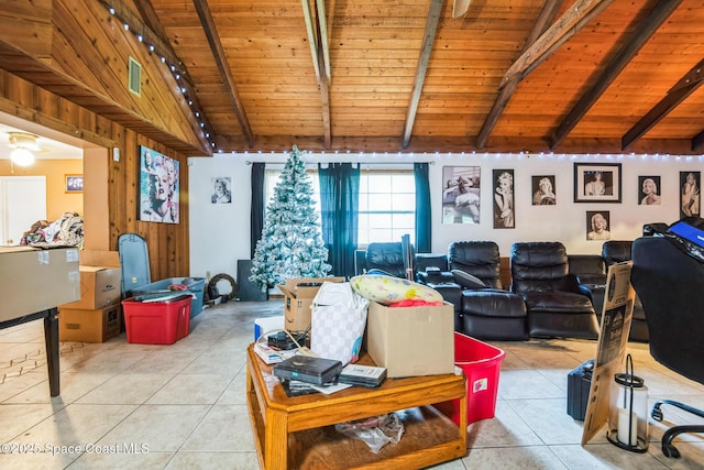 living room featuring light tile patterned floors, visible vents, lofted ceiling with beams, wood walls, and wooden ceiling