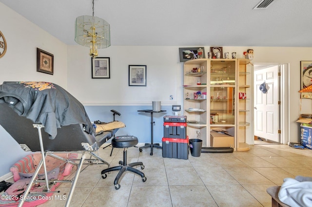 interior space with visible vents and tile patterned floors