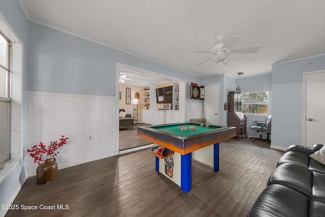 recreation room featuring billiards, crown molding, and wood finished floors