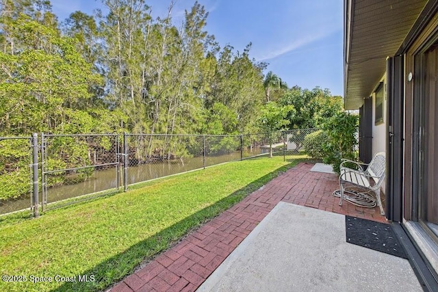 view of yard featuring a patio and a fenced backyard