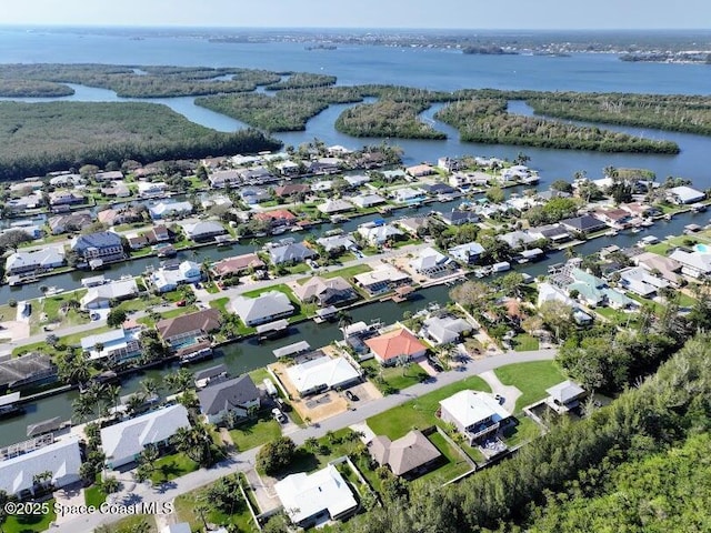 bird's eye view with a residential view and a water view