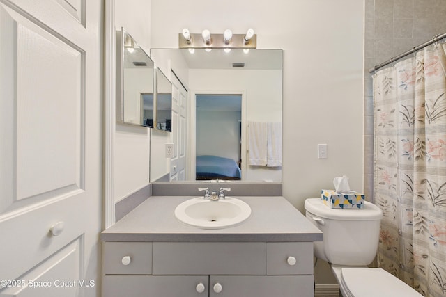 bathroom with curtained shower, connected bathroom, toilet, vanity, and visible vents