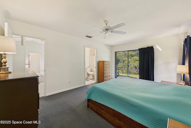 bedroom featuring baseboards, arched walkways, connected bathroom, ceiling fan, and carpet floors