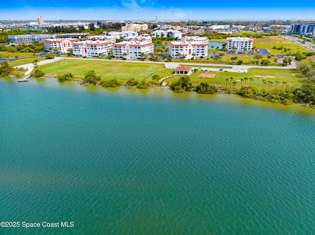 aerial view with a water view and a city view