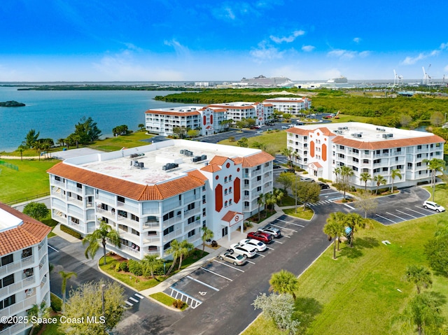 drone / aerial view with a water view