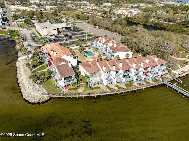 drone / aerial view with a water view