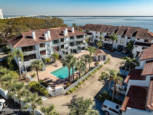 aerial view with a residential view and a water view