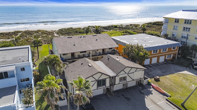 aerial view featuring a beach view and a water view