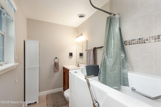 full bath with shower / tub combo, visible vents, baseboards, tile patterned flooring, and vanity