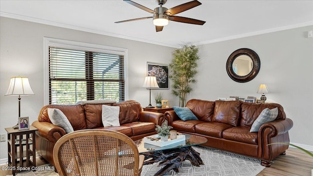 3794 Rambling Acres Dr, Titusville, FL 32796 - living area with ornamental molding, wood finished floors, a ceiling fan, and baseboards